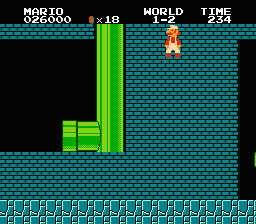 [Image showing Mario sliding through the wall, and into the Warp Zone]