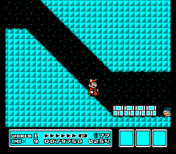 [Image of Mario sliding down an underground hill]