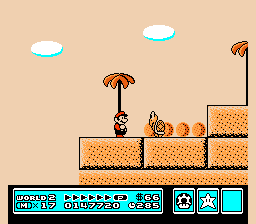 [Image of Mario in a desert level, next to a yellow Koopa Troopa]